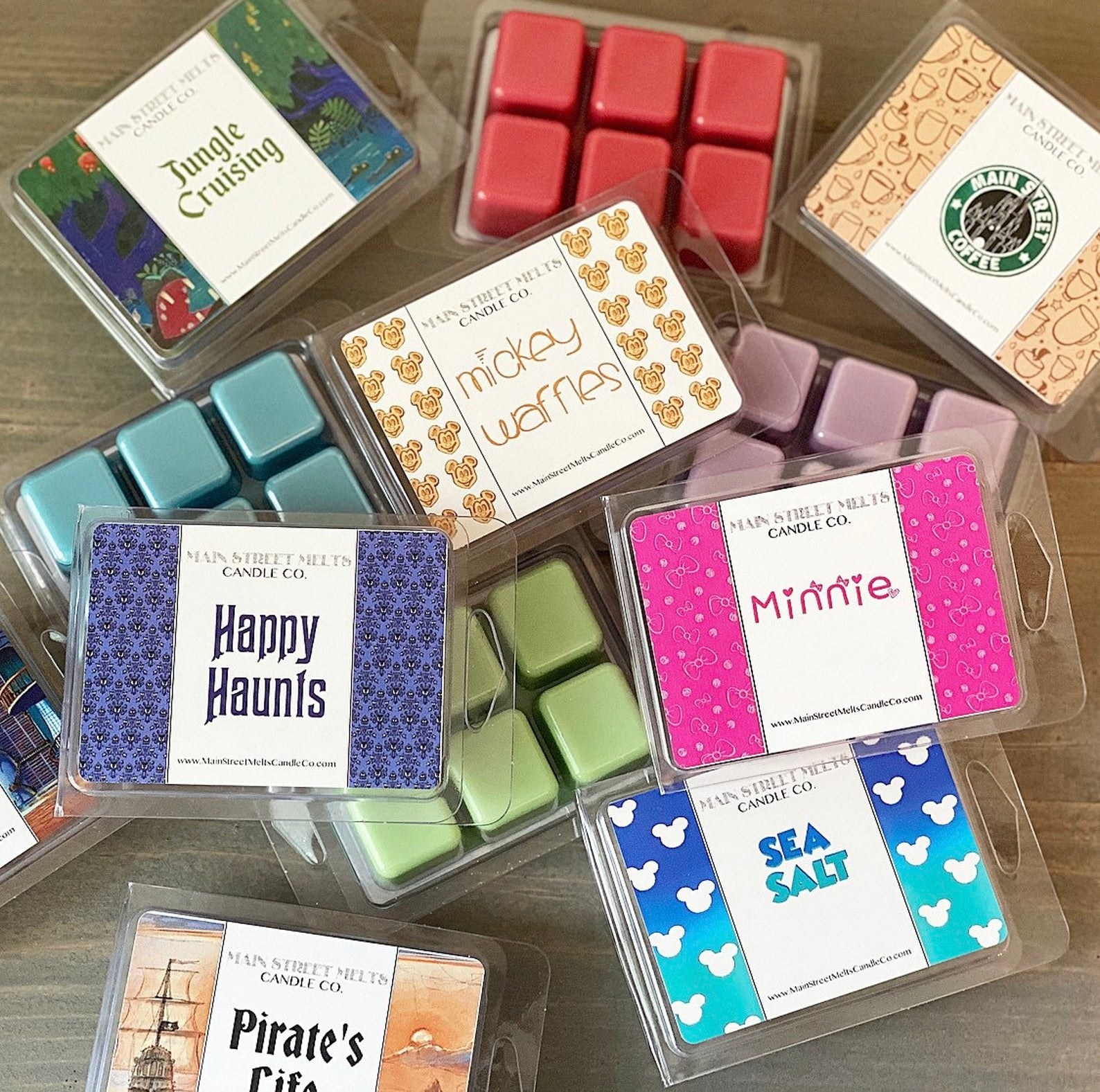 Wax melts with Disney themes like &quot;happy haunts&quot; and &quot;minnie&quot; and &quot;mickey waffles&quot; 