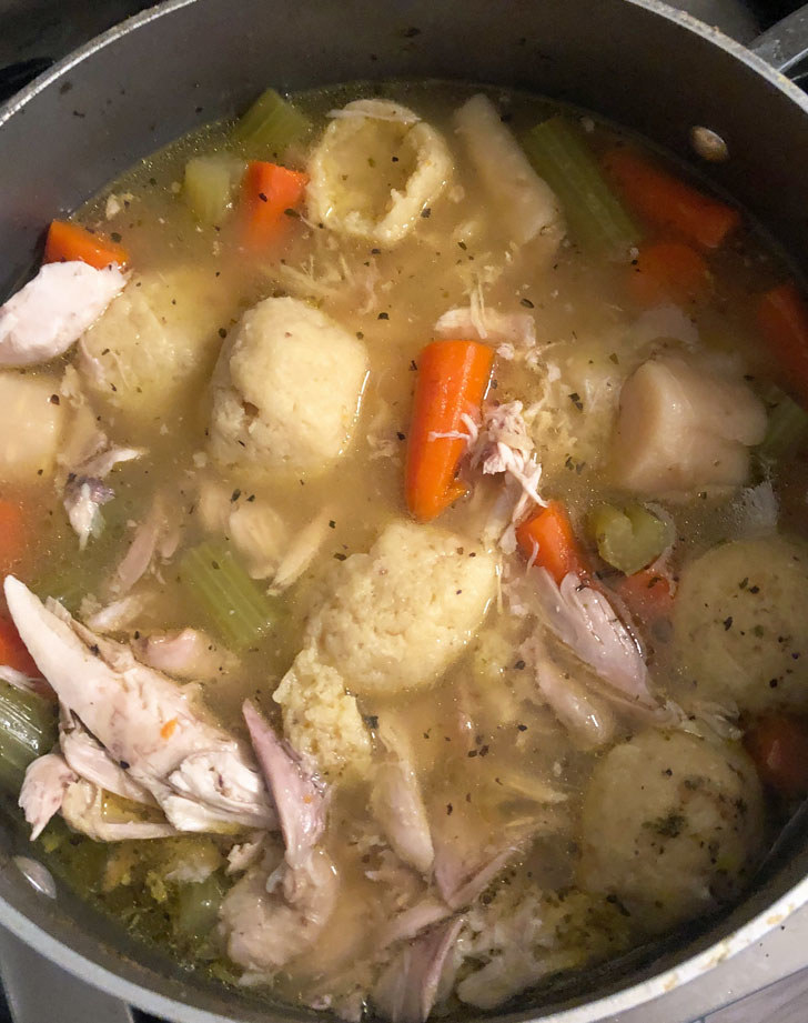 A big pot of chicken matzo ball soup.