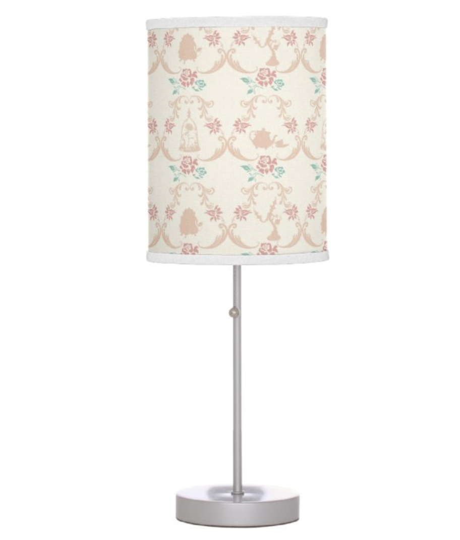 Lamp with silver base and a shade with pastel rose pattern 