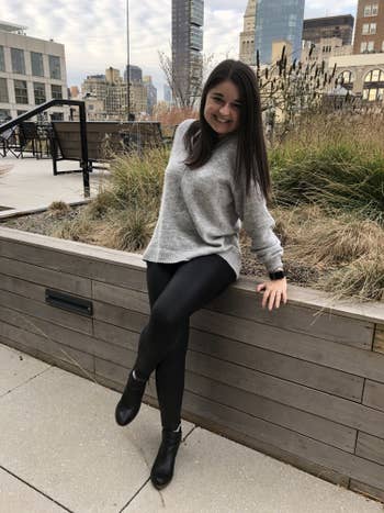 buzzfeed editor in the black faux leather leggings