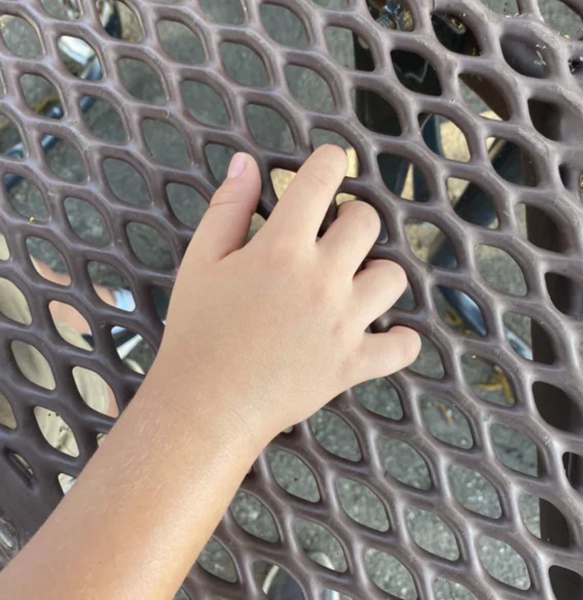 fingers stuck in a table