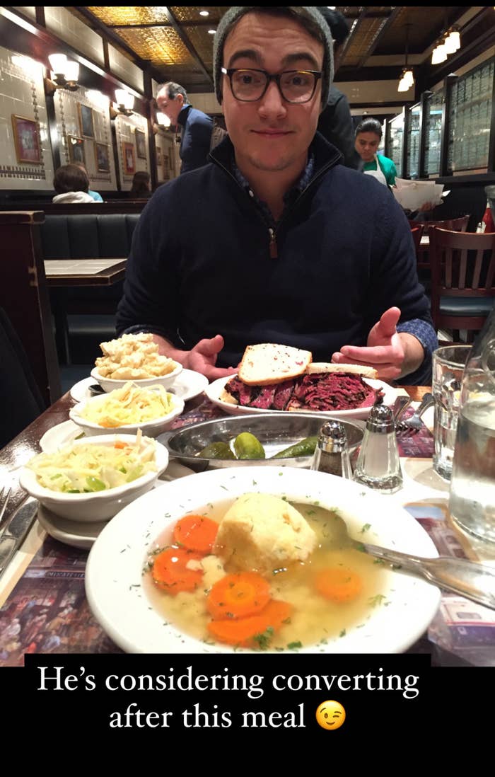 My husband, Zack, eating at a Jewish deli.