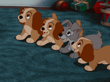 A gif of puppies from &quot;Lady and the Tramp&quot; wagging their tails
