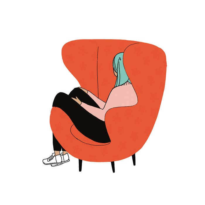 Illustration of a person sitting in a large chair with legs folded over the arm of the chair, facing away from us. 