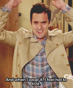 Nick Miller from New Girl wearing a women&#x27;s coat saying, &quot;and when I wear it I feel hot to trot.&quot;