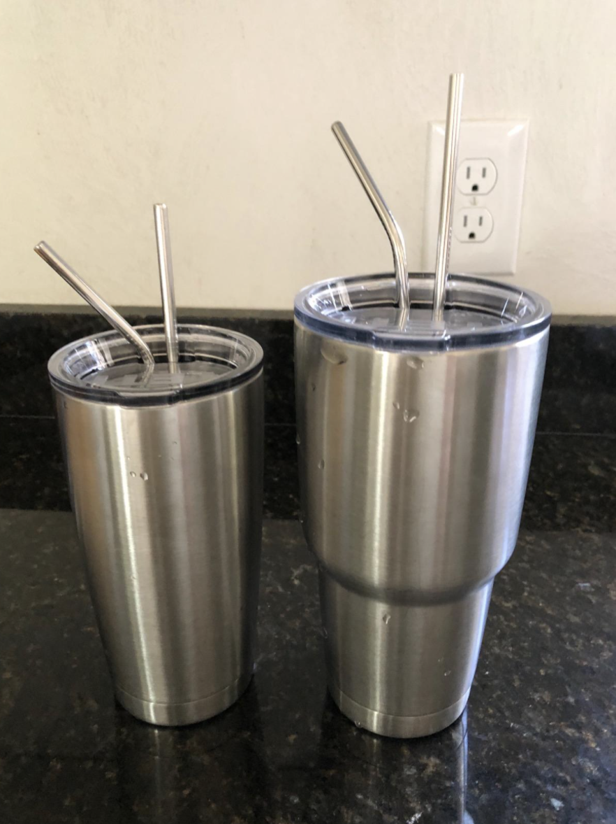 A reviewer's tumblers with the straws