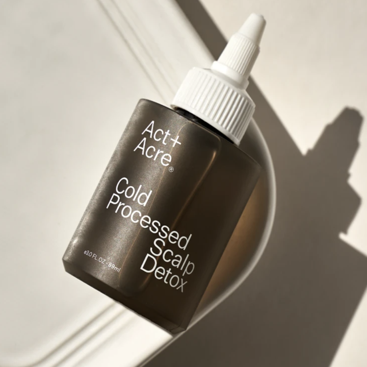 the brown bottle of cold pressed scalp detox