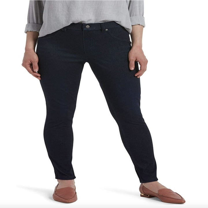 A pair of denim leggings