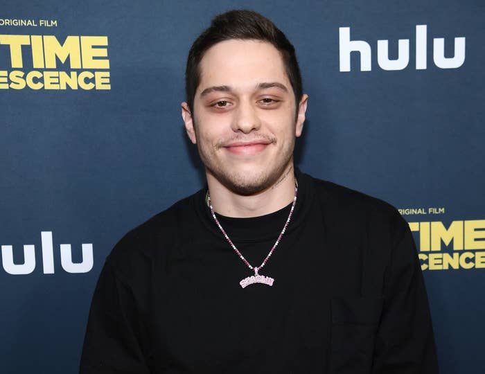 Pete smiles on a red carpet