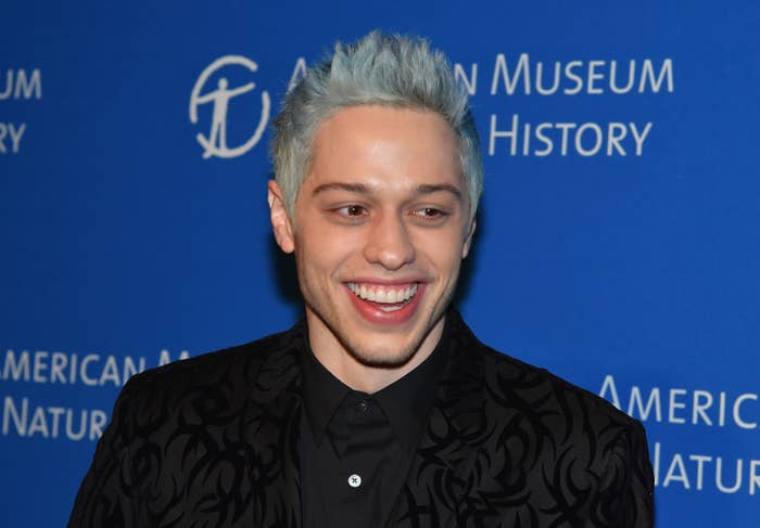 Pete smiles on a red carpet