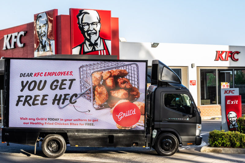 A Grill&#x27;d truck outside of a KFC with the caption &quot;Dear KFC employees, you get free HFC&quot;