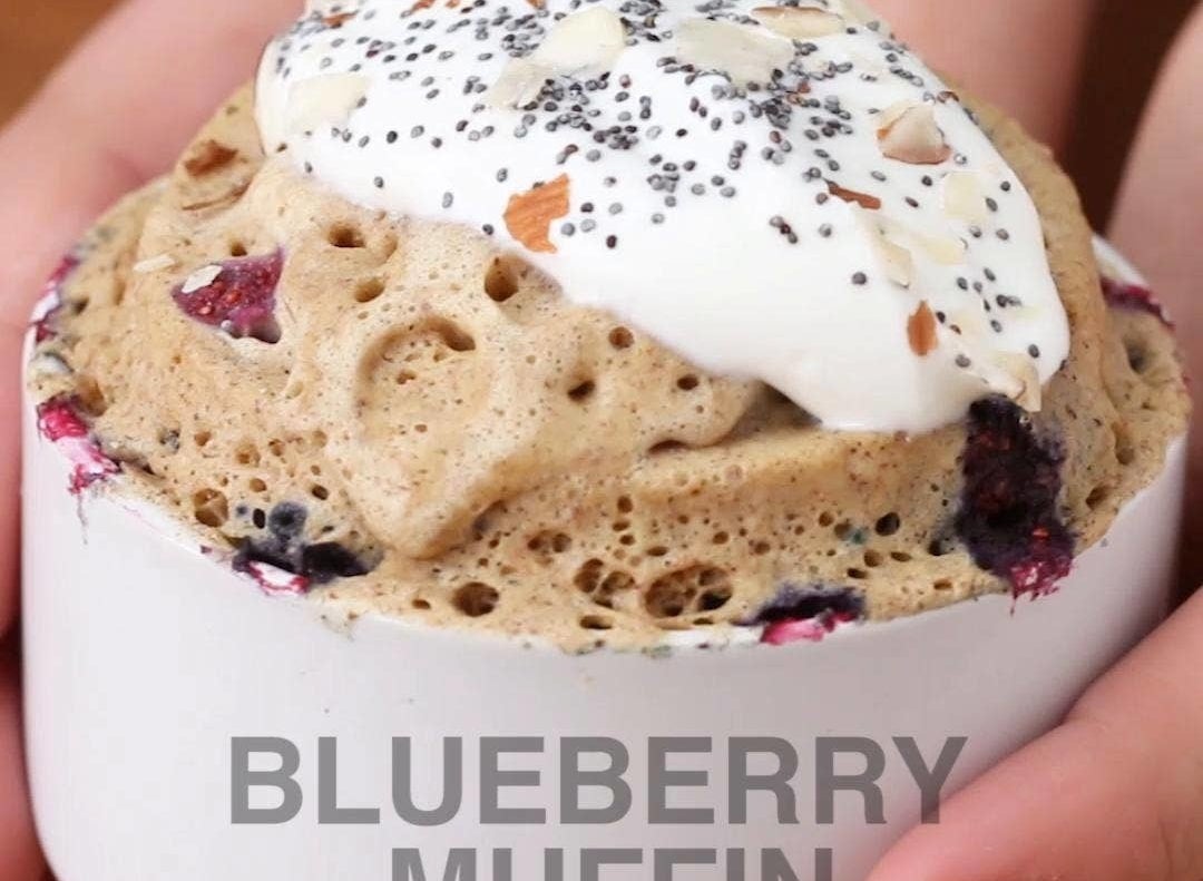Muffin topped with whip cream 