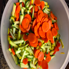 a reviewer photo of sliced squash and carrots