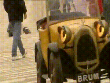 Gif of Brum speeding through a crowd, spinning, then coming to a stop 