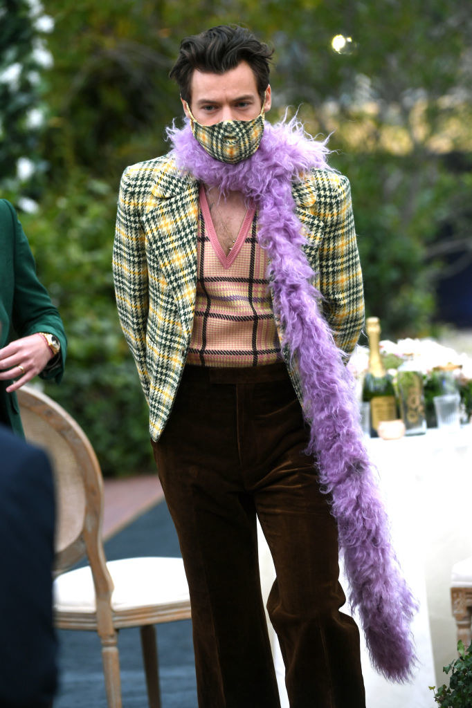 Harry Styles wears a matching plaid face mask as he attends the 63rd Annual Grammy Awards 