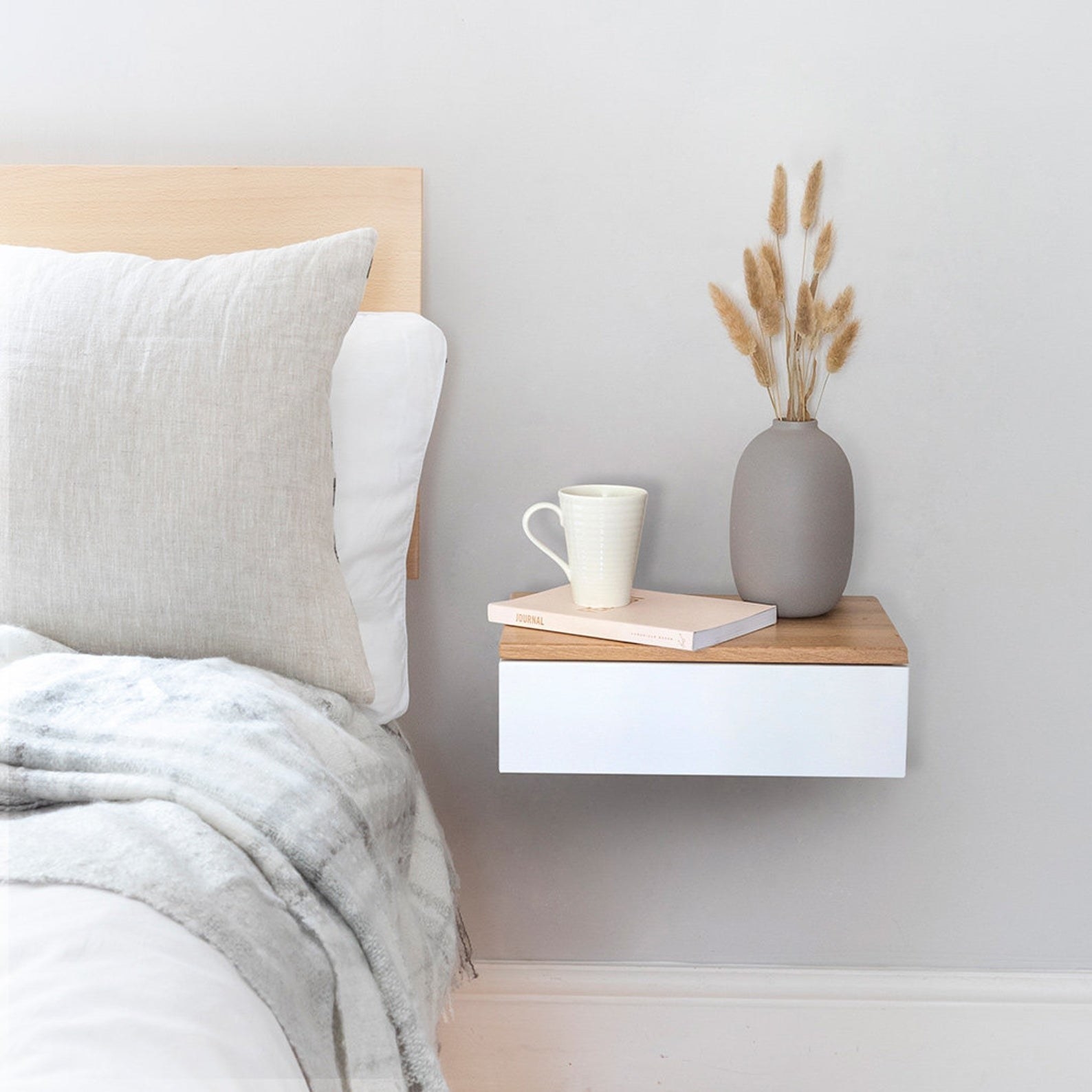 Floating bedside drawer in bedroom