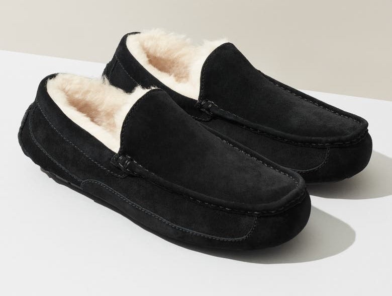 The black suede slippers with a cream-covered shearling lining