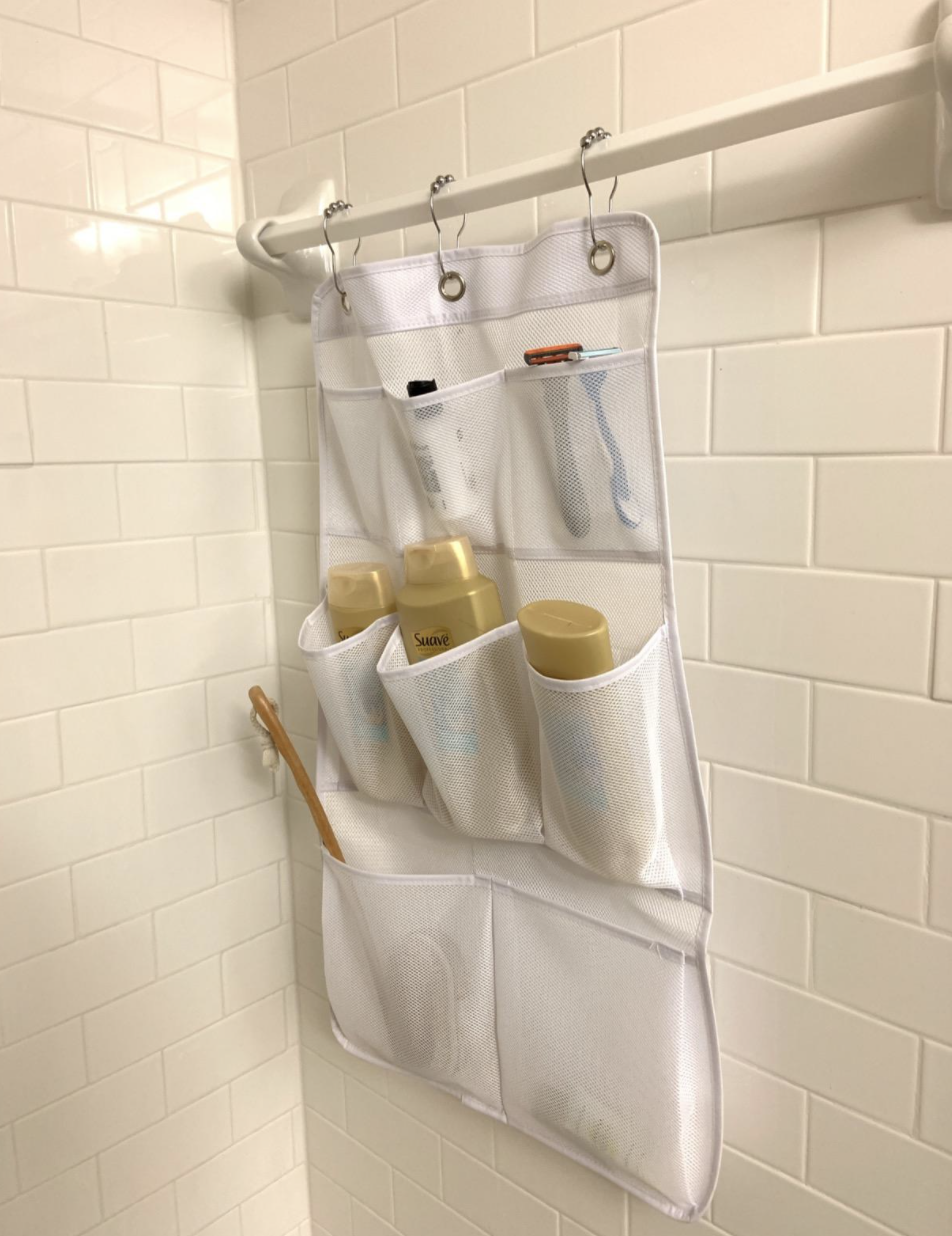 A customer review photo of the shower curtain caddy