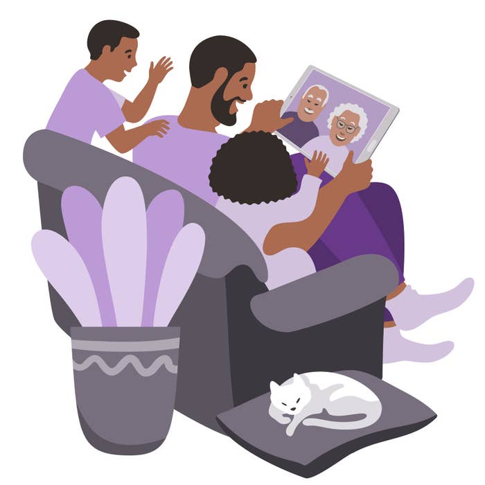 A father, son, and daughter sit on a couch and talk with two grandparents via FaceTime on a tablet in this illustration