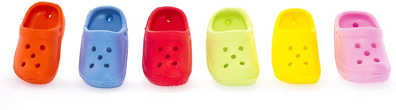 A pack of 6-multi colored shoe toys that look like little Crocs