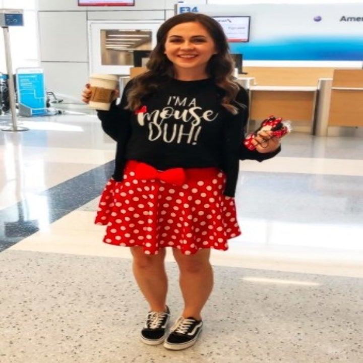 person wearing a red polka dot skirt