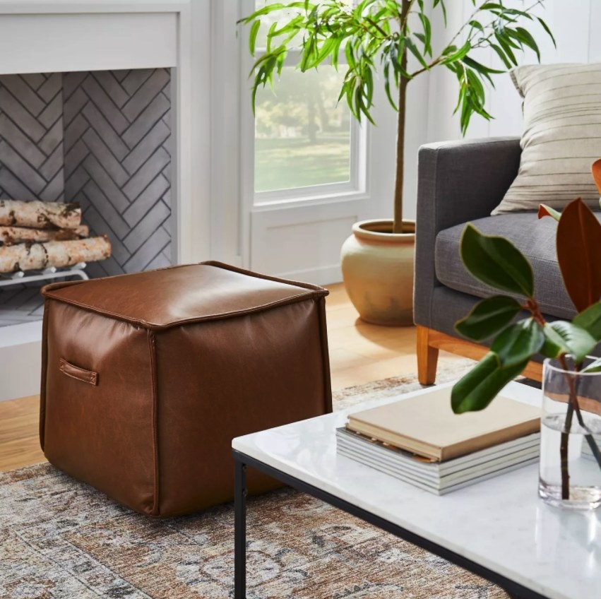 The cube pouf in a living room