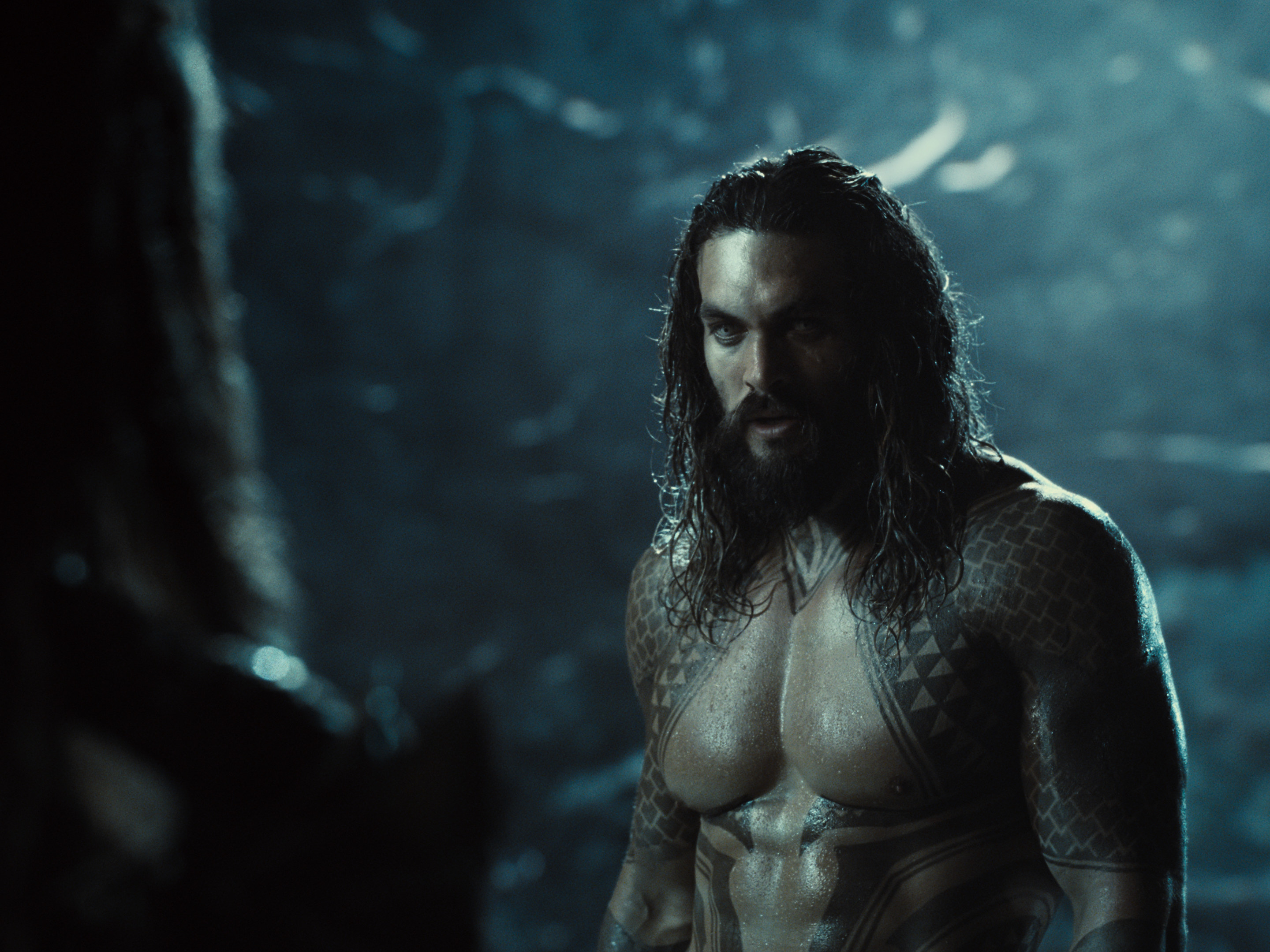 A shirtless Jason Momoa as Aquaman