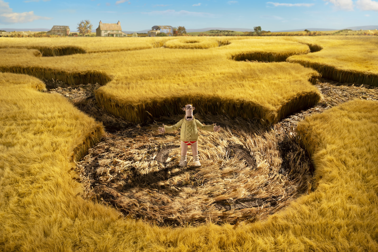 man in field with crop circles