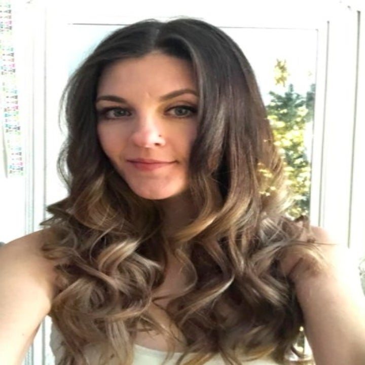 person with beachy waves after using a curling wand
