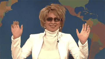 A gif of Maya Rudolph dressed as Whitney Houston doing a little dance on SNL