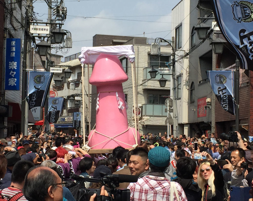  A giant penis is carried through the streets at the Phallus Festival