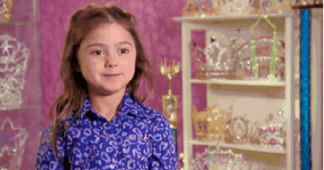 A girl smiling from Toddlers and Tiaras