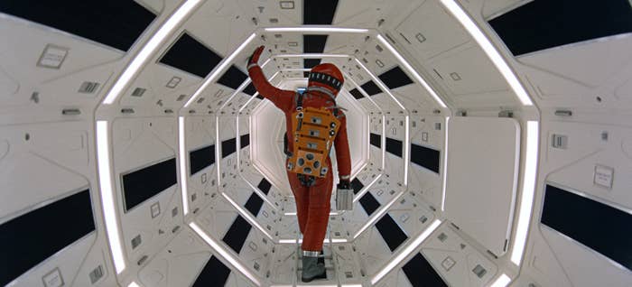 Iconic photo of an astronaut walking through spaceship hallway 