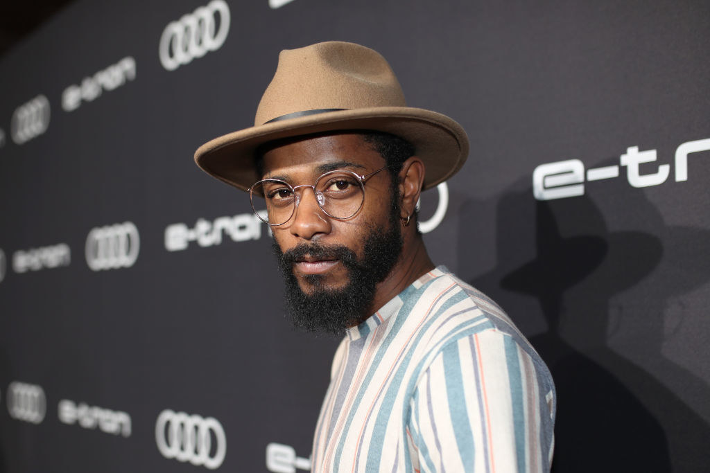 Lakeith Stanfield attends the Audi pre-Emmy celebration at Sunset Tower in a fedora