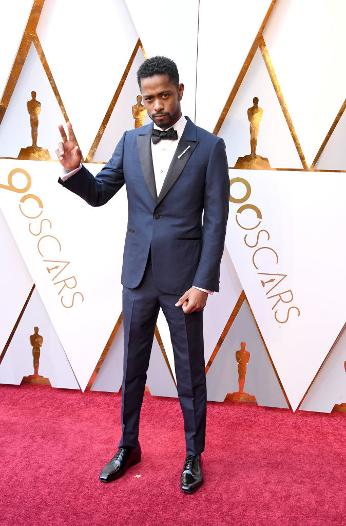 Lakeith Stanfield giving the peace sign on the red carpet of the 90th Annual Academy Awards at Hollywood &amp;amp; Highland Center