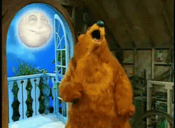 Bear dancing in the attic, with Luna the moon dancing behind him 
