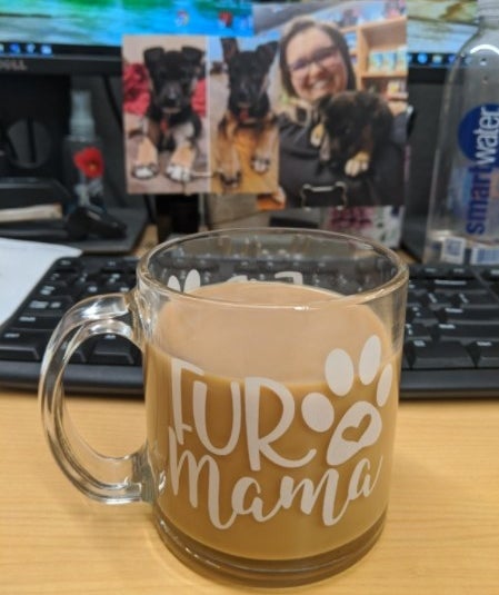 The coffee mug with words &quot;fur mama&quot; on it