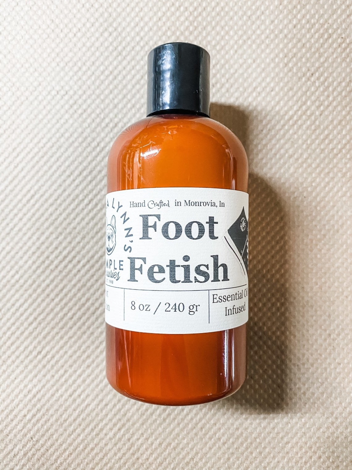 Amber bottle with Foot Fetish label 