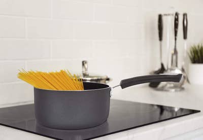 A saucepan with pasta in it