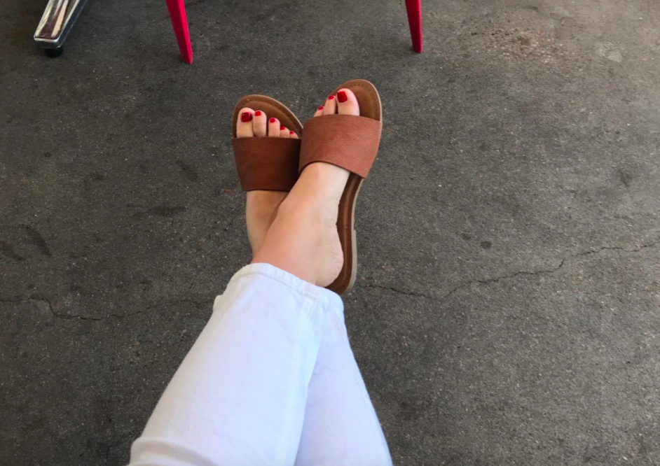 Reviewer wearing the tan slides