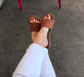 Reviewer wearing the tan slides