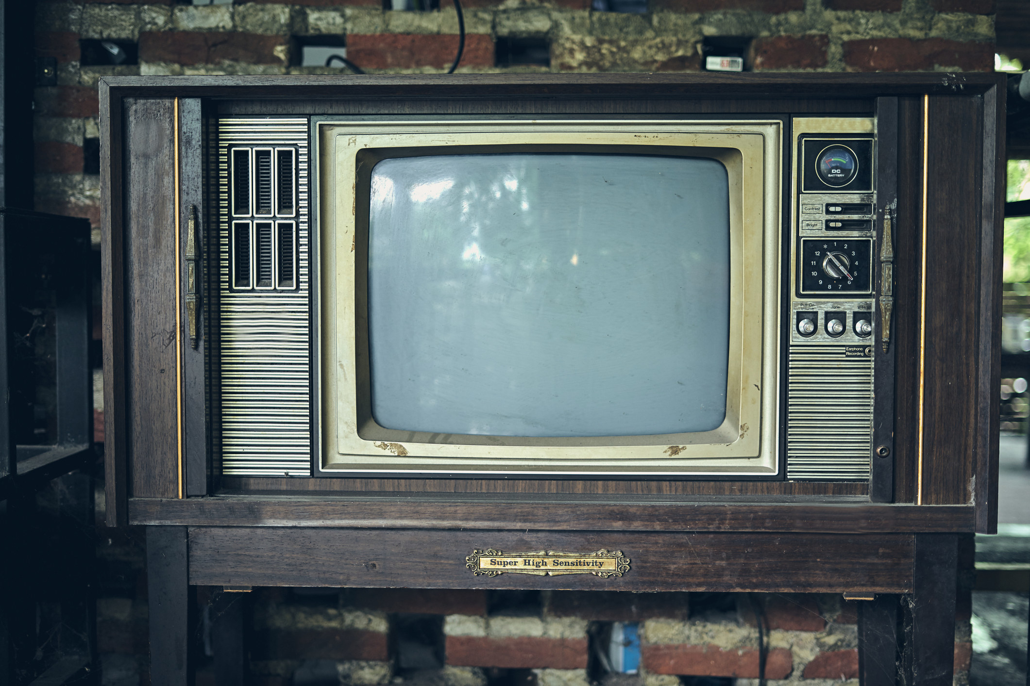 Old antique monochrome television in vintage living room