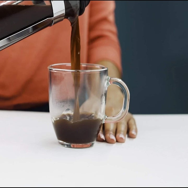 Model pouring coffee 
