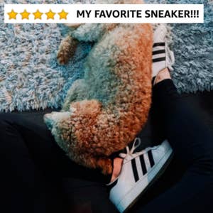 Reviewer wearing the classic adidas with five-star Amazon caption "my favorite sneaker"