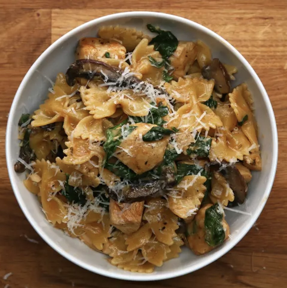 bowtie pasta with chicken and mushrooms in a bowl