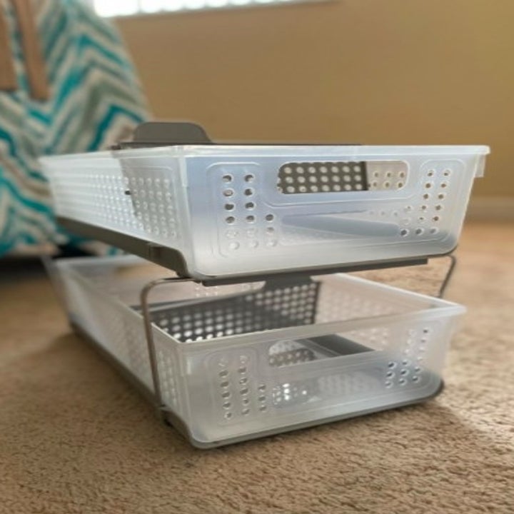 reviewer's empty stacked slide-out storage containers