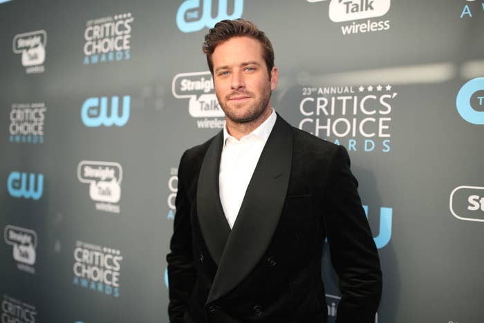 Armie posing on the red carpet at the 23rd Annual Critics&#x27;s Choice Awards