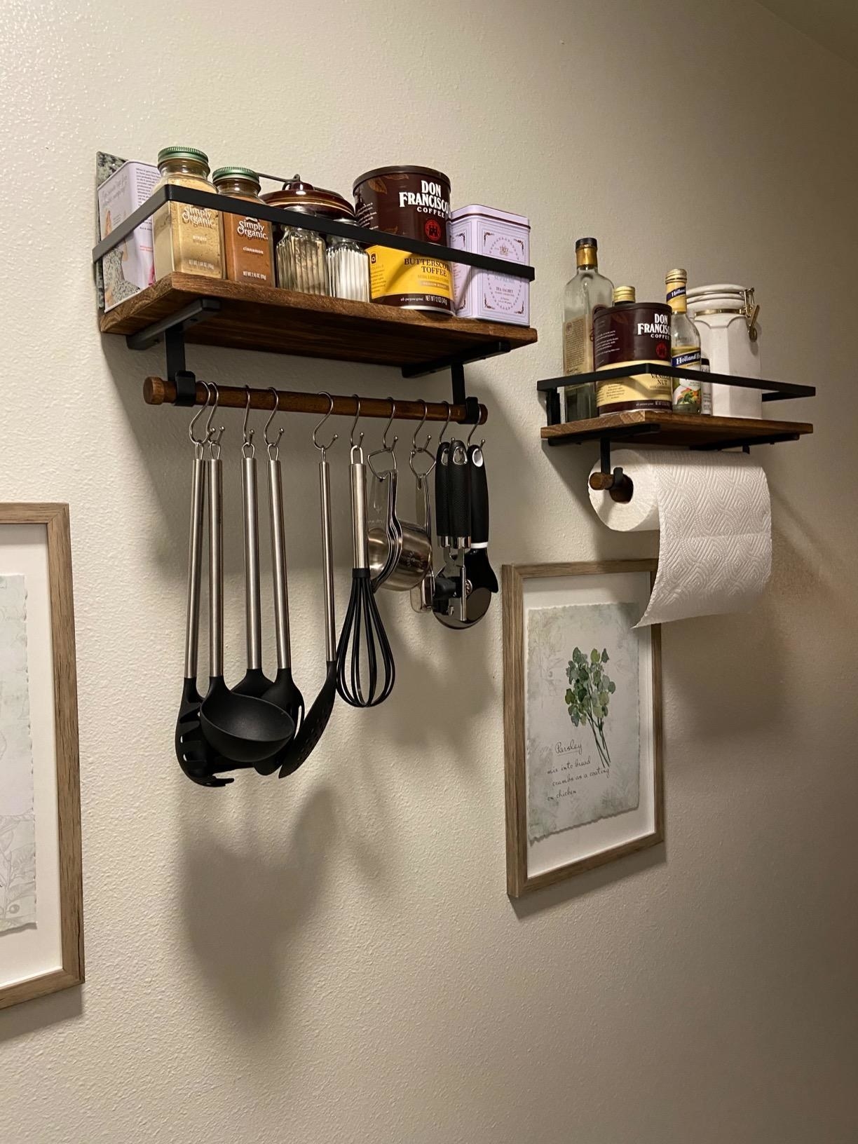 The racks, which have one storage shelf, and a hanging bar that can used as a paper towel rack, or can hold extra items using removable hooks