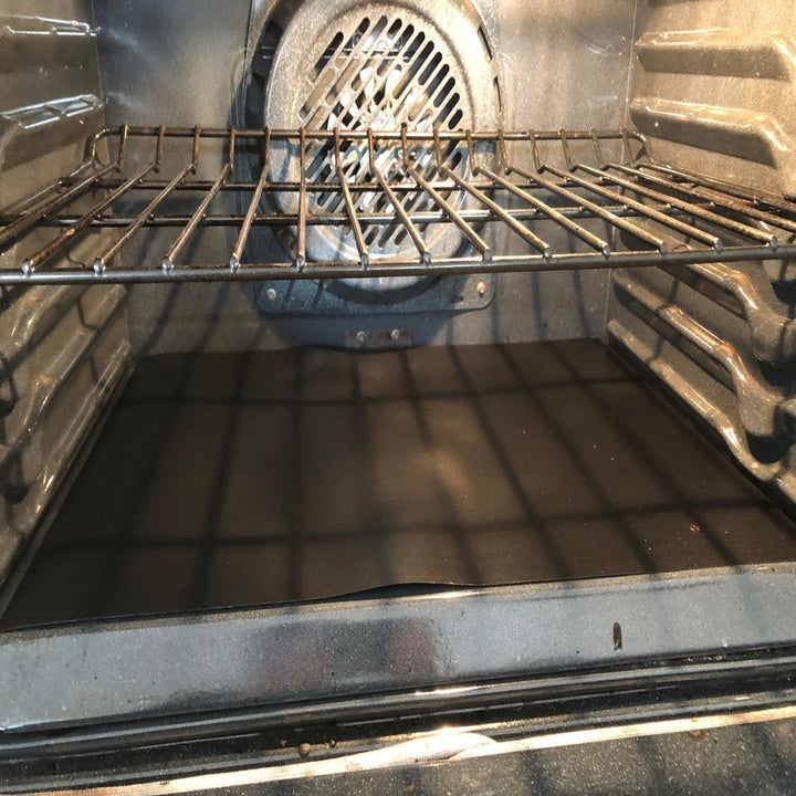 Reviewer photo of oven liner placed on bottom of oven
