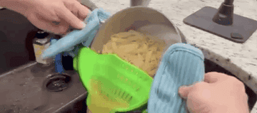 Gif of the clip-on silicone colander in action